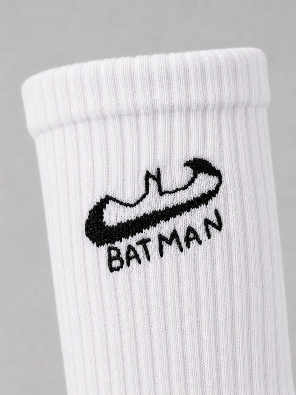 White socks with Batman embroidery
